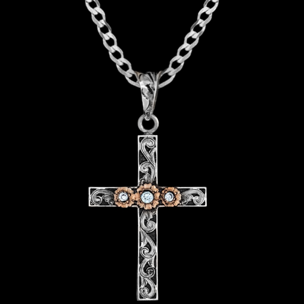 Introducing the John Cross Pendant Necklace, crafted from hand-engraved German silver, embellished with copper flowers and radiant zirconias. Pair it with a discounted Sterling Silver chain today!